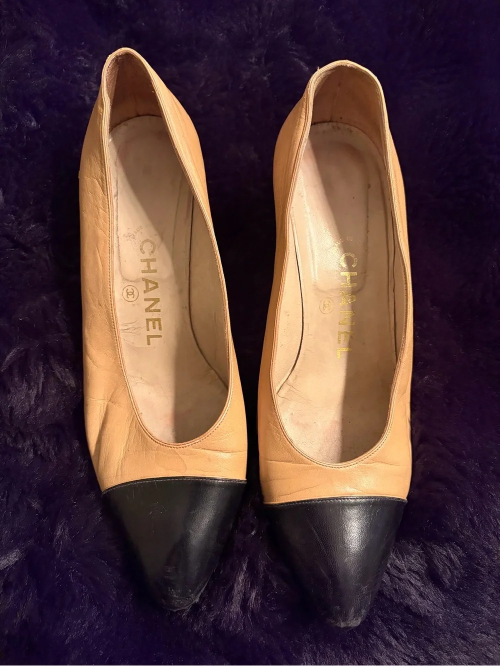CHANEL Classic Beige & Black Cap Toe Pumps – Timeless Parisian Elegance